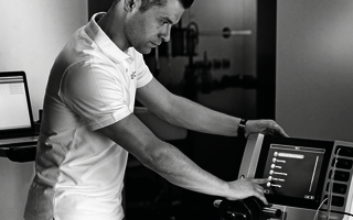 Biomedical engineer checking an erbe unit.